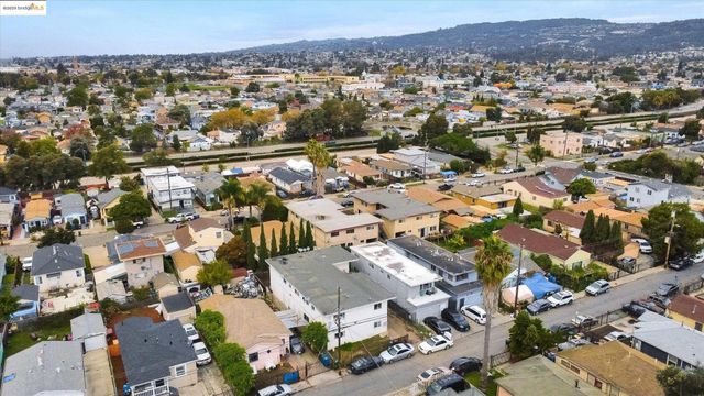 an aerial view of city and green space