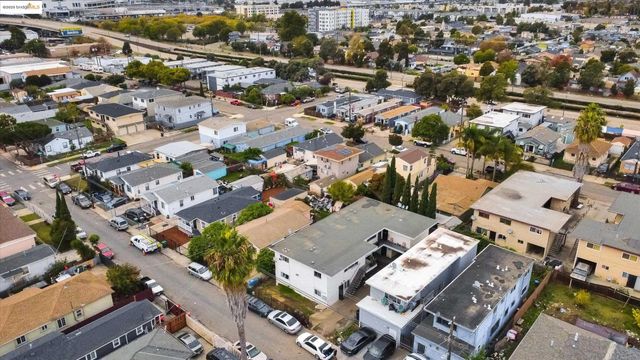 an aerial view of a city with lots of residential buildings
