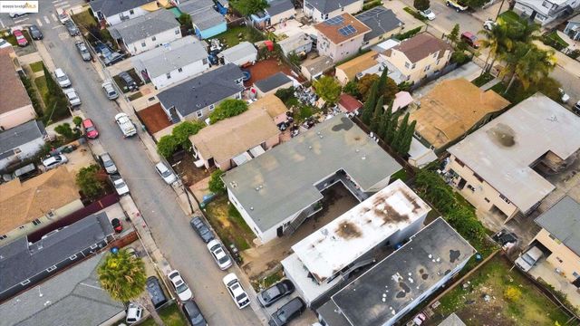 an aerial view of a house with a outdoor space