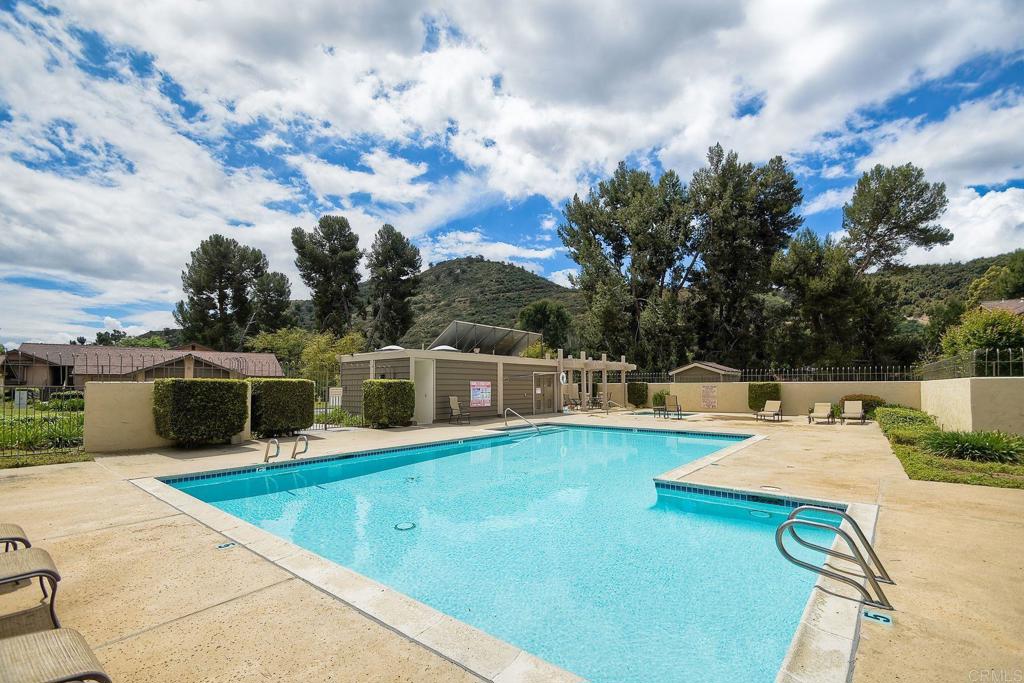 4135 Pinehurst Court Fallbrook, CA 92028 - Photo 24 of 25 a view of a swimming pool with an outdoor seating