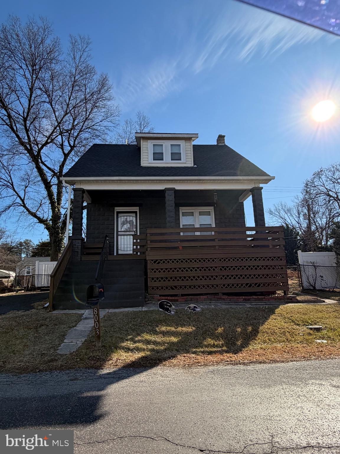8003 Duvall Avenue Baltimore, MD 21237 - Photo 1 of 1 a front view of a house with a yard
