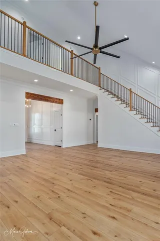 a view of a livingroom with wooden floor