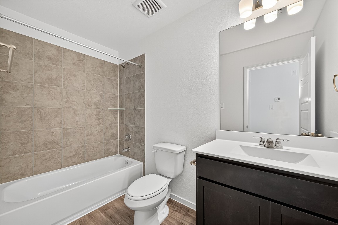 20835 Attalos Stoa Road Crosby, TX 77532 - Photo 40 of 46 a bathroom with a sink a toilet and a bathtub