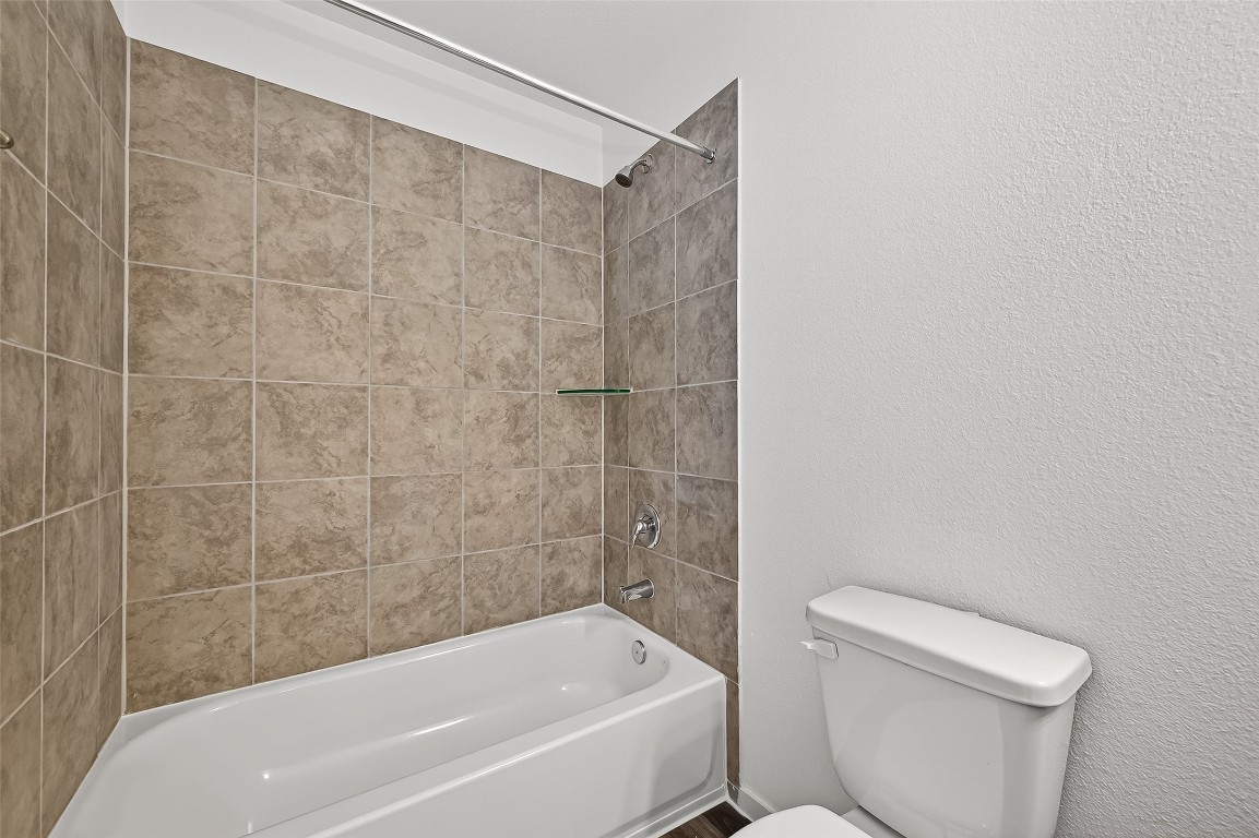 20835 Attalos Stoa Road Crosby, TX 77532 - Photo 41 of 46 a bathroom with a bathtub and a toilet