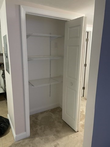 870 Haverhill Street, Unit 2B Rowley, MA 01969 - Photo 11 of 21 a view of an empty walk in closet