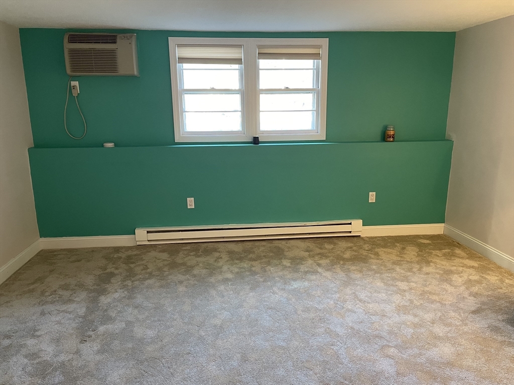 870 Haverhill Street, Unit 2B Rowley, MA 01969 - Photo 15 of 21 a view of a room with window