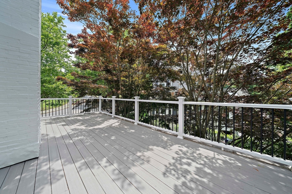 37 Wolcott Road, Unit 37 Brookline, MA 02467 - Photo 34 of 40 a view of a wooden deck