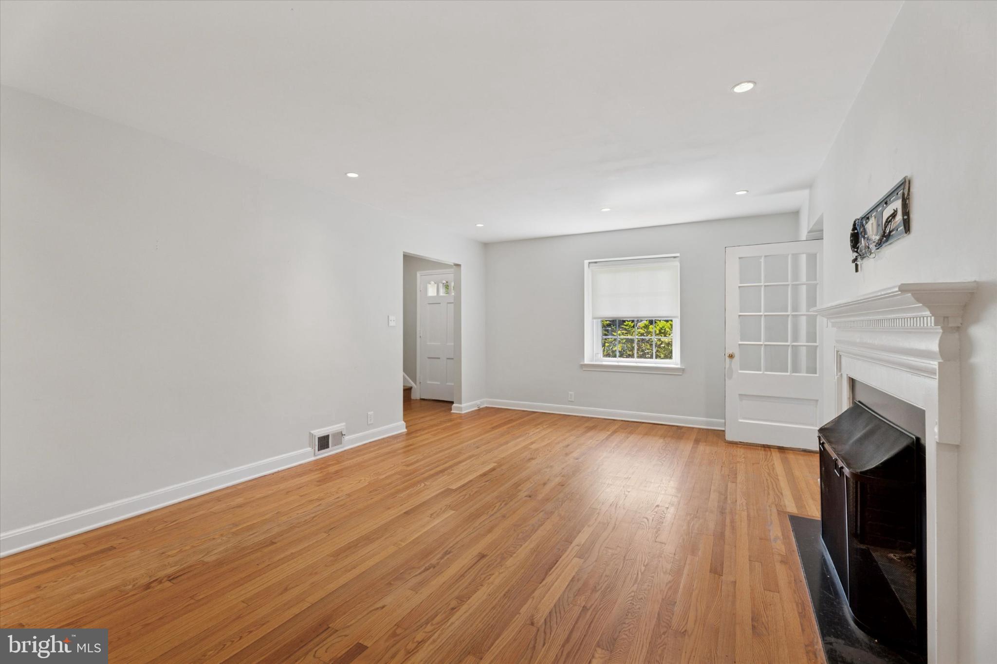 907 Nicholson Road Wynnewood, PA 19096 - Photo 3 of 23 Gas fireplace in Living Room with TV hookup above