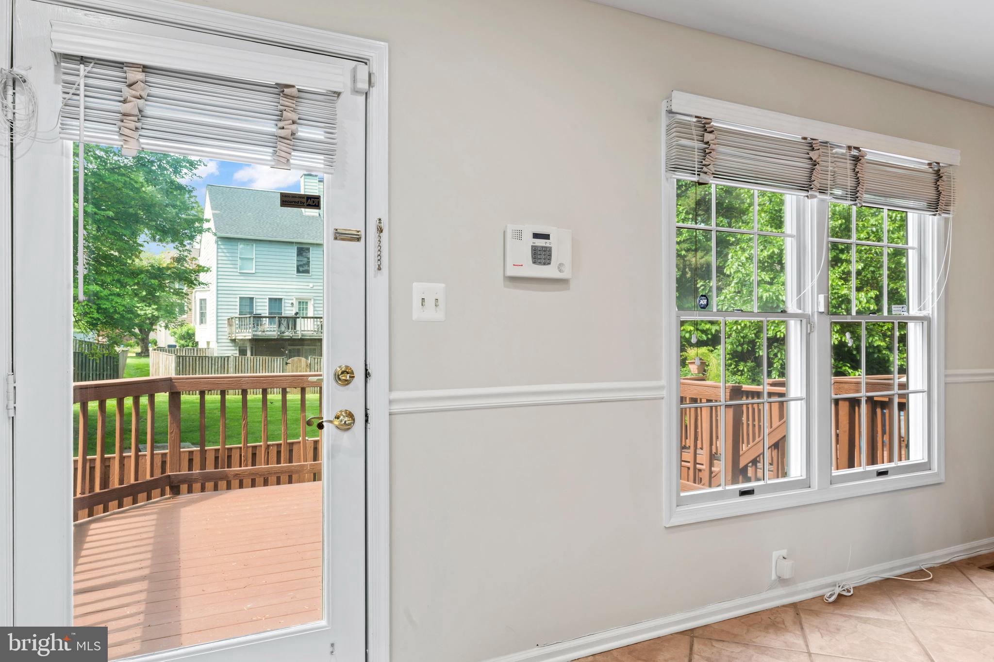 7850 Blue Gray Circle Manassas, VA 20109 - Photo 14 of 42 a view of a porch and a yard