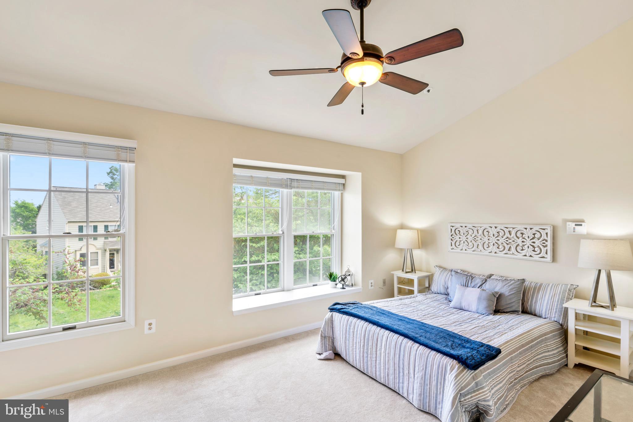7850 Blue Gray Circle Manassas, VA 20109 - Photo 16 of 42 a bedroom with a bed and a window