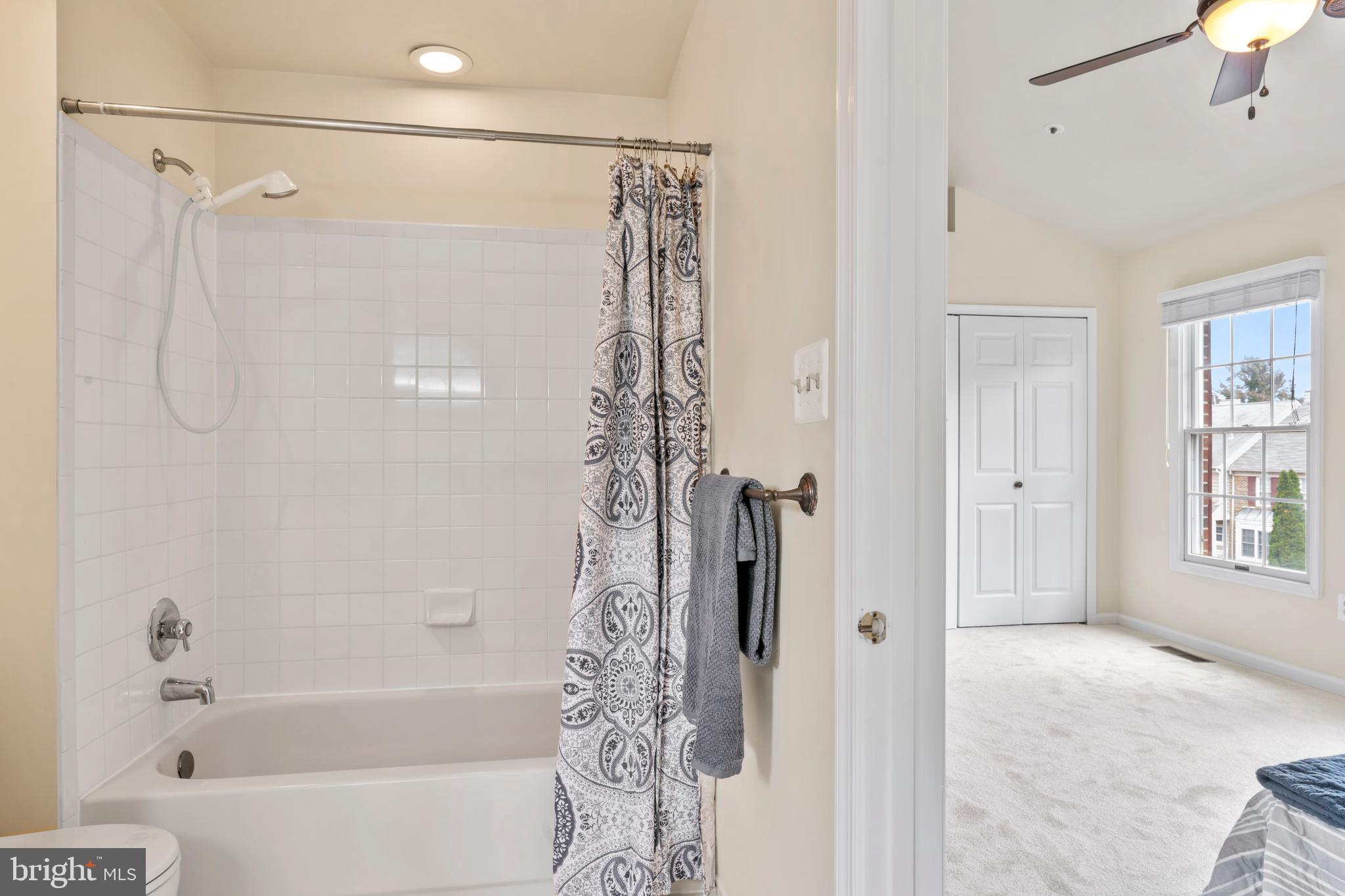 7850 Blue Gray Circle Manassas, VA 20109 - Photo 19 of 42 a bathroom with a shower a bathtub and a shower