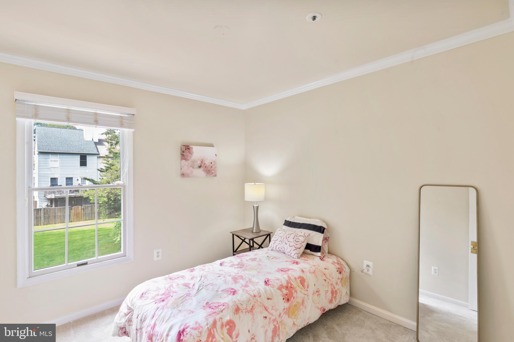 7850 Blue Gray Circle Manassas, VA 20109 - Photo 20 of 42 a bedroom with a bed and a window