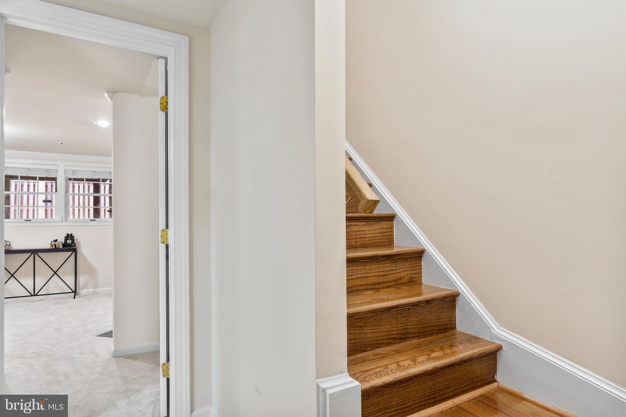 7850 Blue Gray Circle Manassas, VA 20109 - Photo 25 of 42 a view of entryway and hall with wooden floor