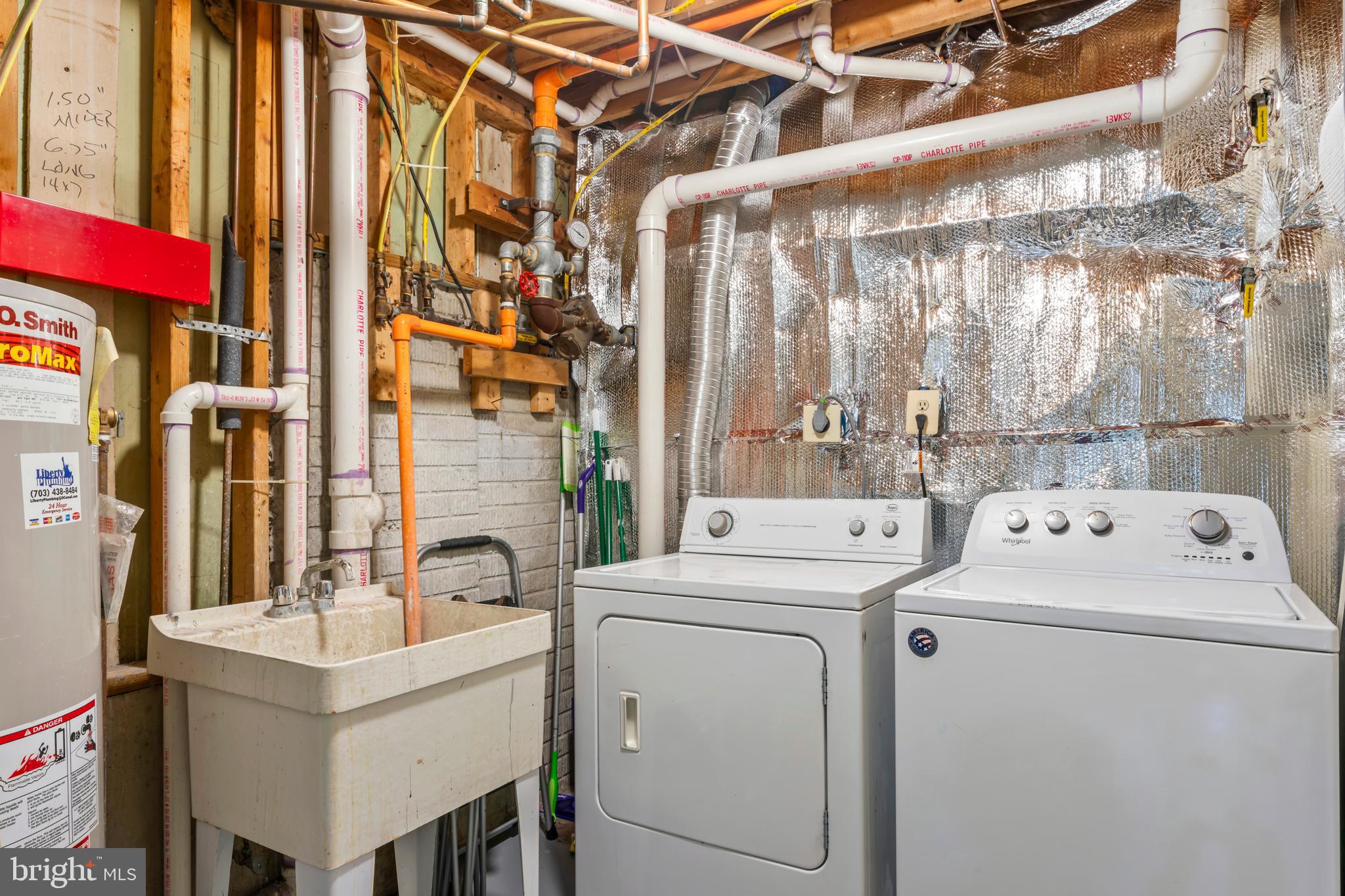 7850 Blue Gray Circle Manassas, VA 20109 - Photo 30 of 42 a utility room with dryer and washer