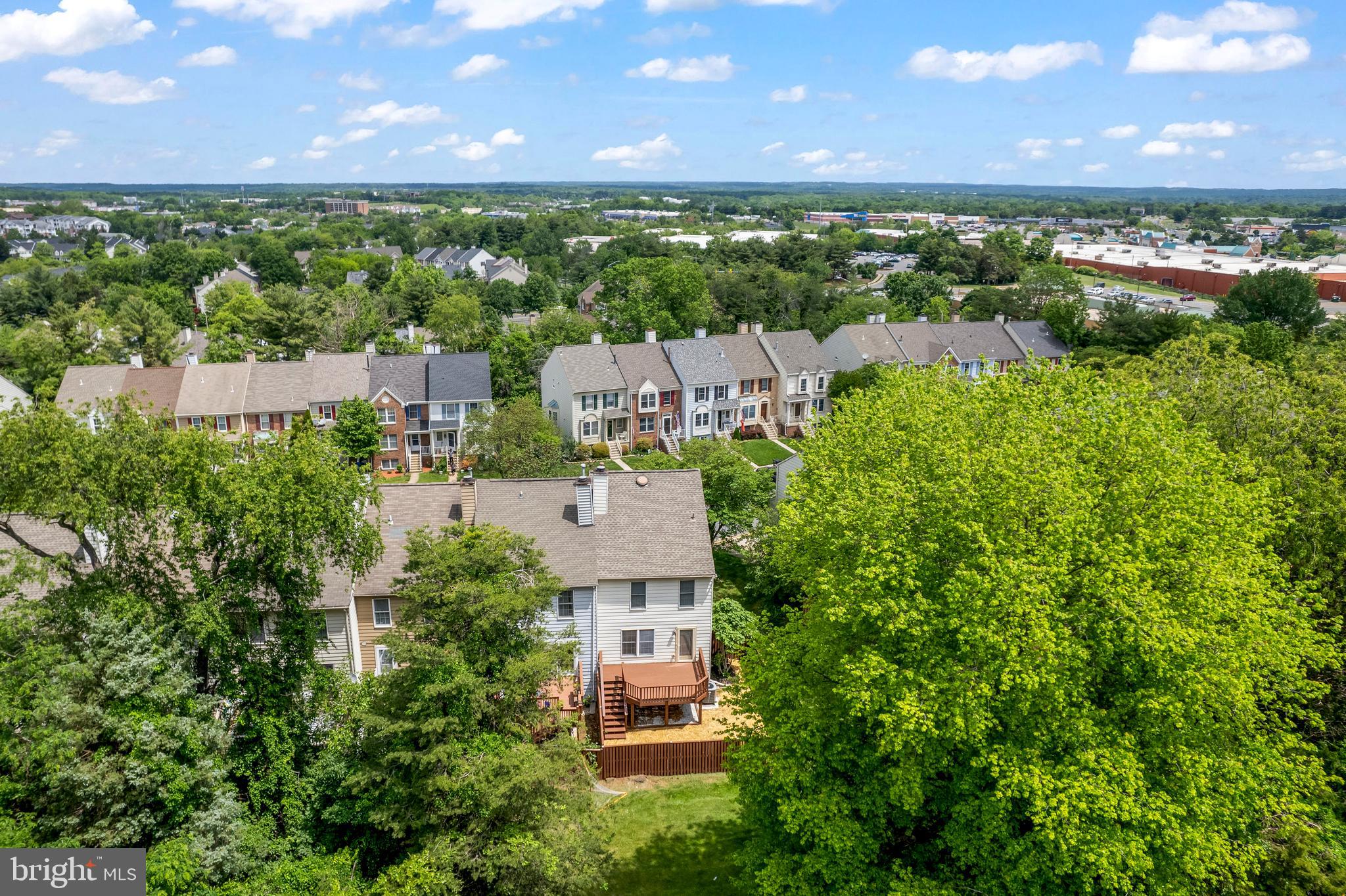 7850 Blue Gray Circle Manassas, VA 20109 - Photo 35 of 42 an aerial view of residential houses with outdoor space and a lake view