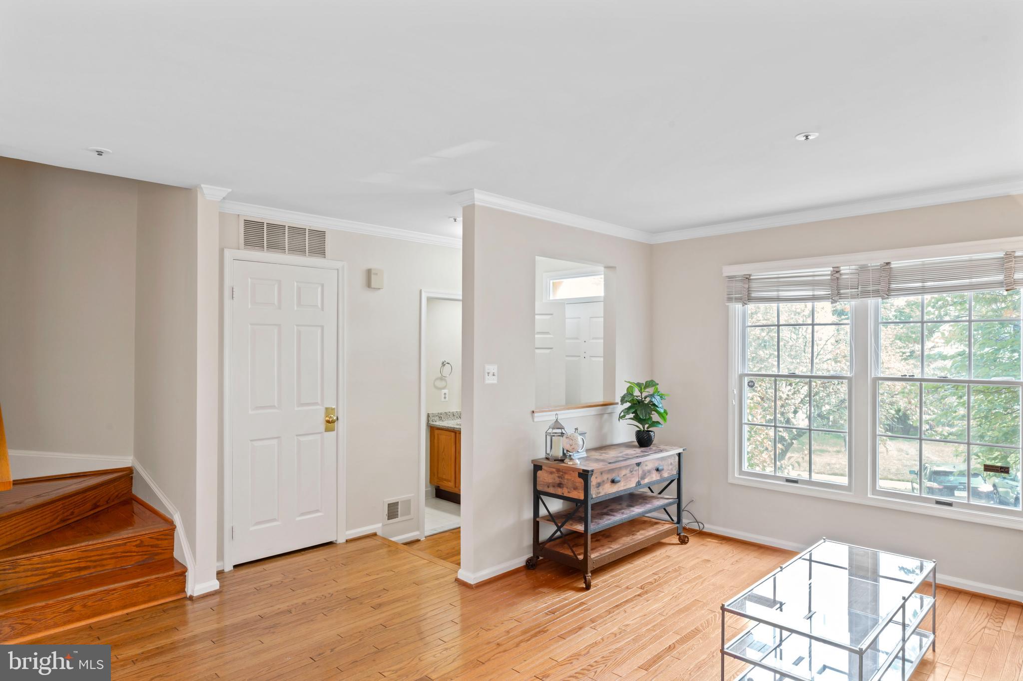 7850 Blue Gray Circle Manassas, VA 20109 - Photo 4 of 42 a living room with furniture and wooden floor