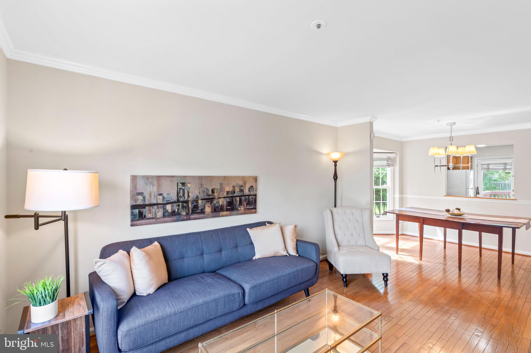 7850 Blue Gray Circle Manassas, VA 20109 - Photo 5 of 42 a living room with furniture and a table