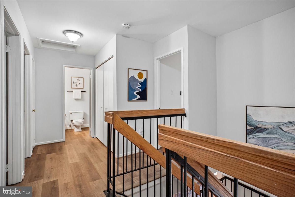 11514 Sunder Court Reston, VA 20190 - Photo 28 of 81 a view of a hallway with workspace