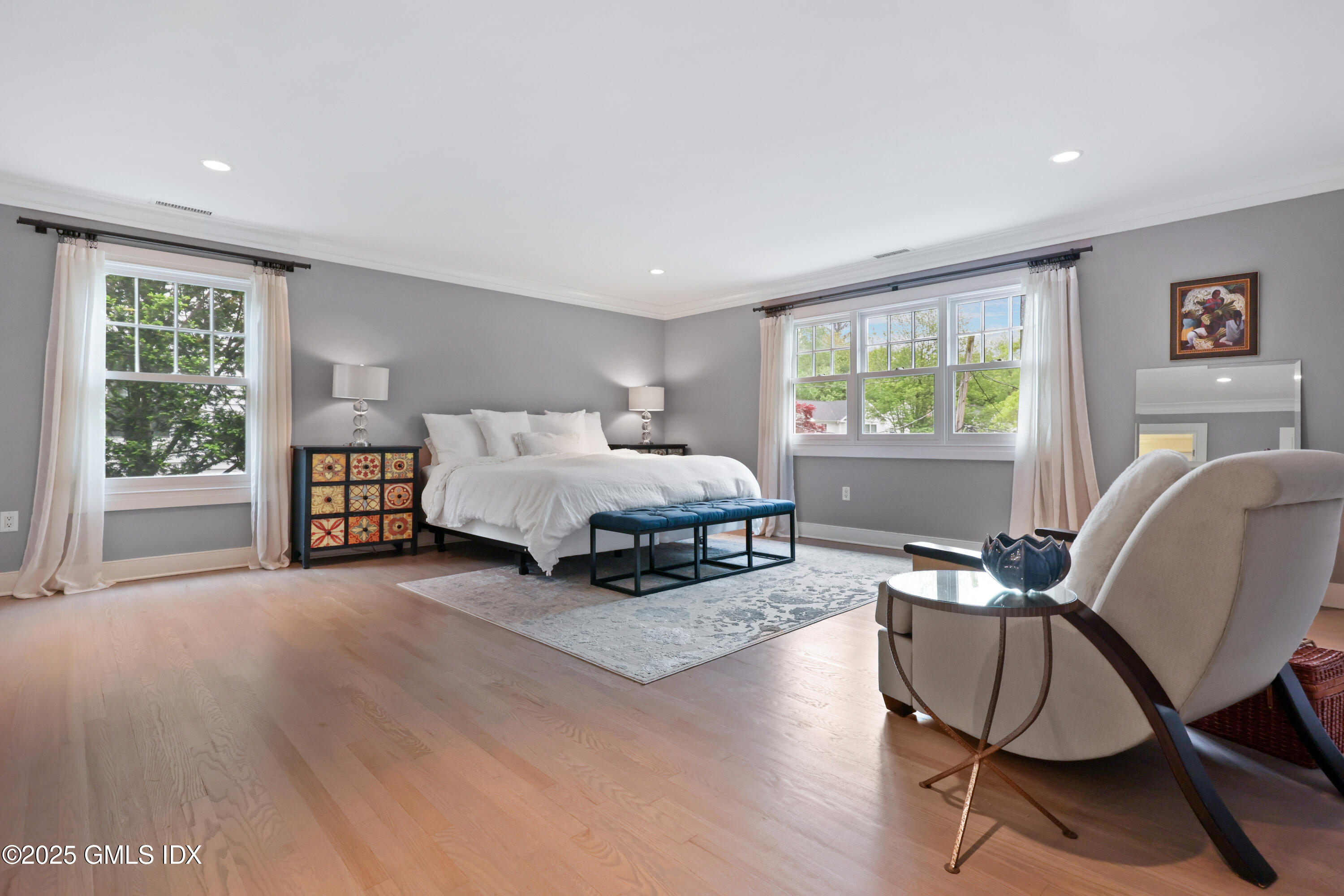 29 Griffith Road Riverside, CT 06878 - Photo 11 of 25 a living room with furniture and a large window