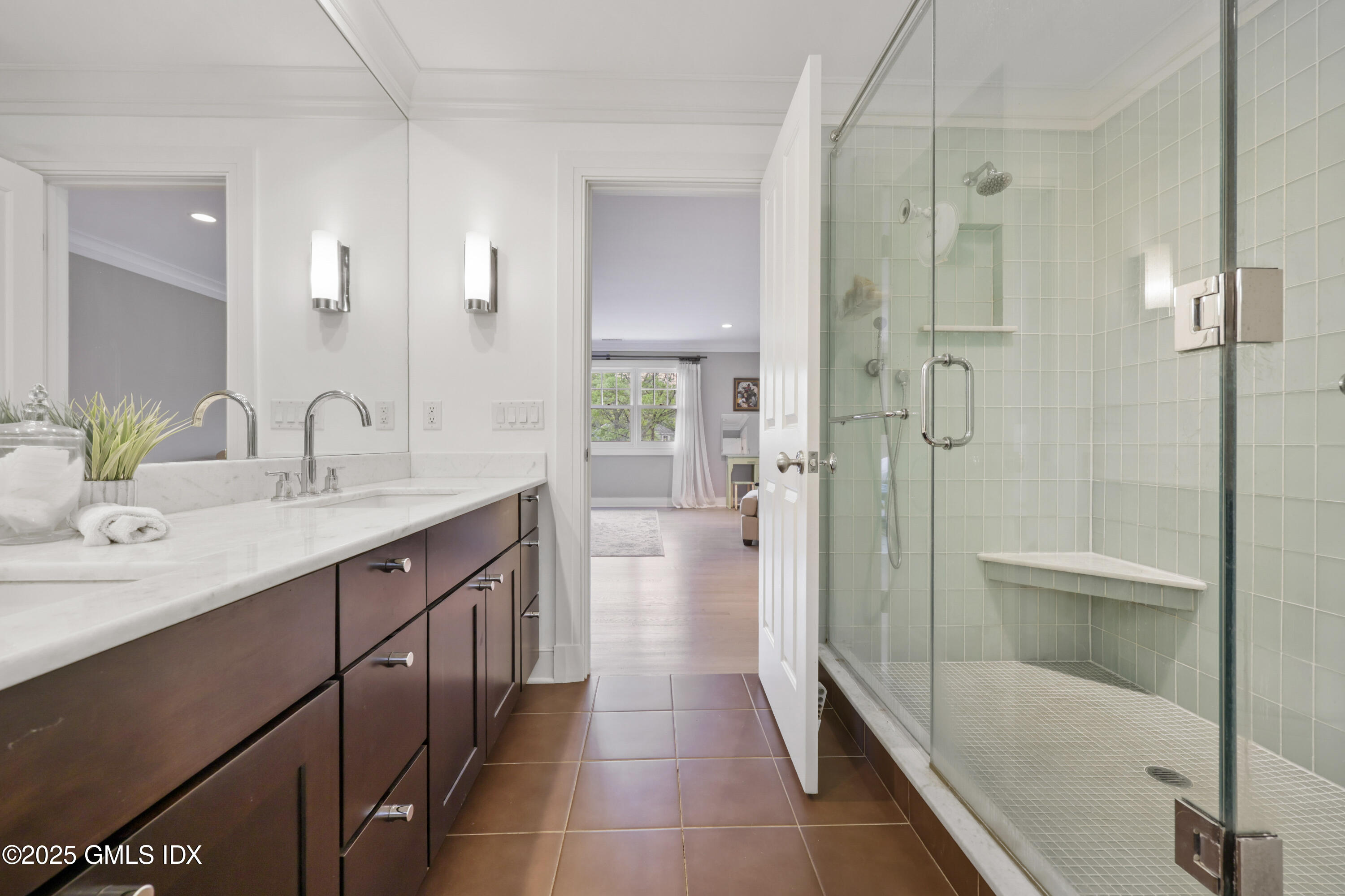 29 Griffith Road Riverside, CT 06878 - Photo 12 of 25 a bathroom with a shower sink and mirror