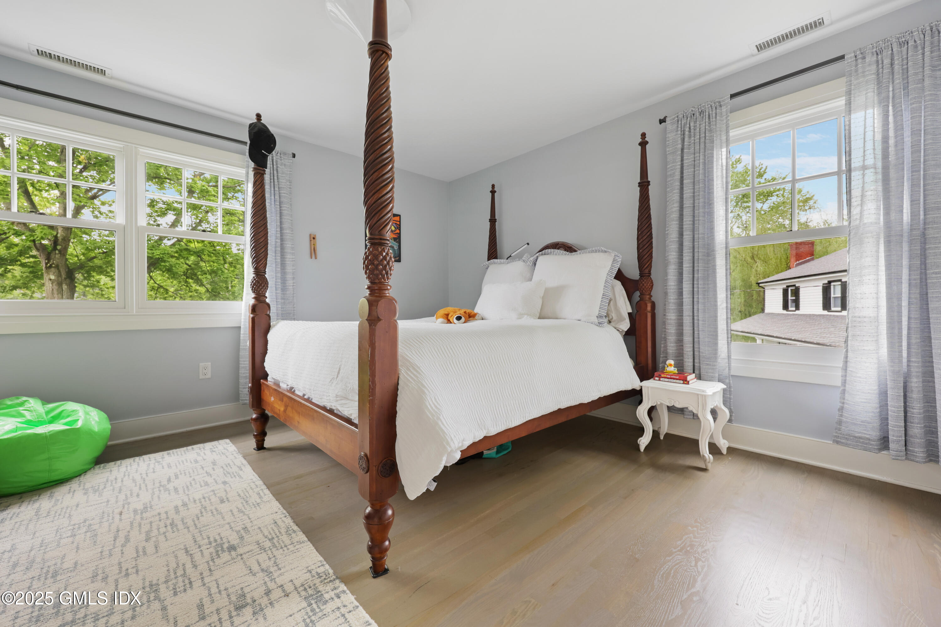 29 Griffith Road Riverside, CT 06878 - Photo 14 of 25 a bedroom with a bed chair and window