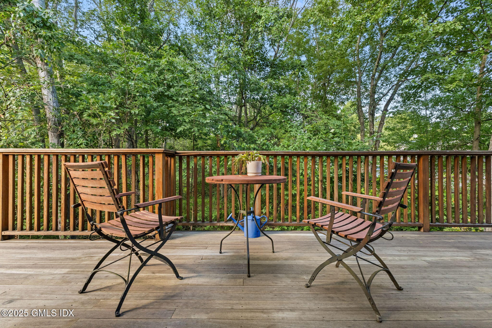 29 Griffith Road Riverside, CT 06878 - Photo 19 of 25 a view of a chairs and table in the balcony