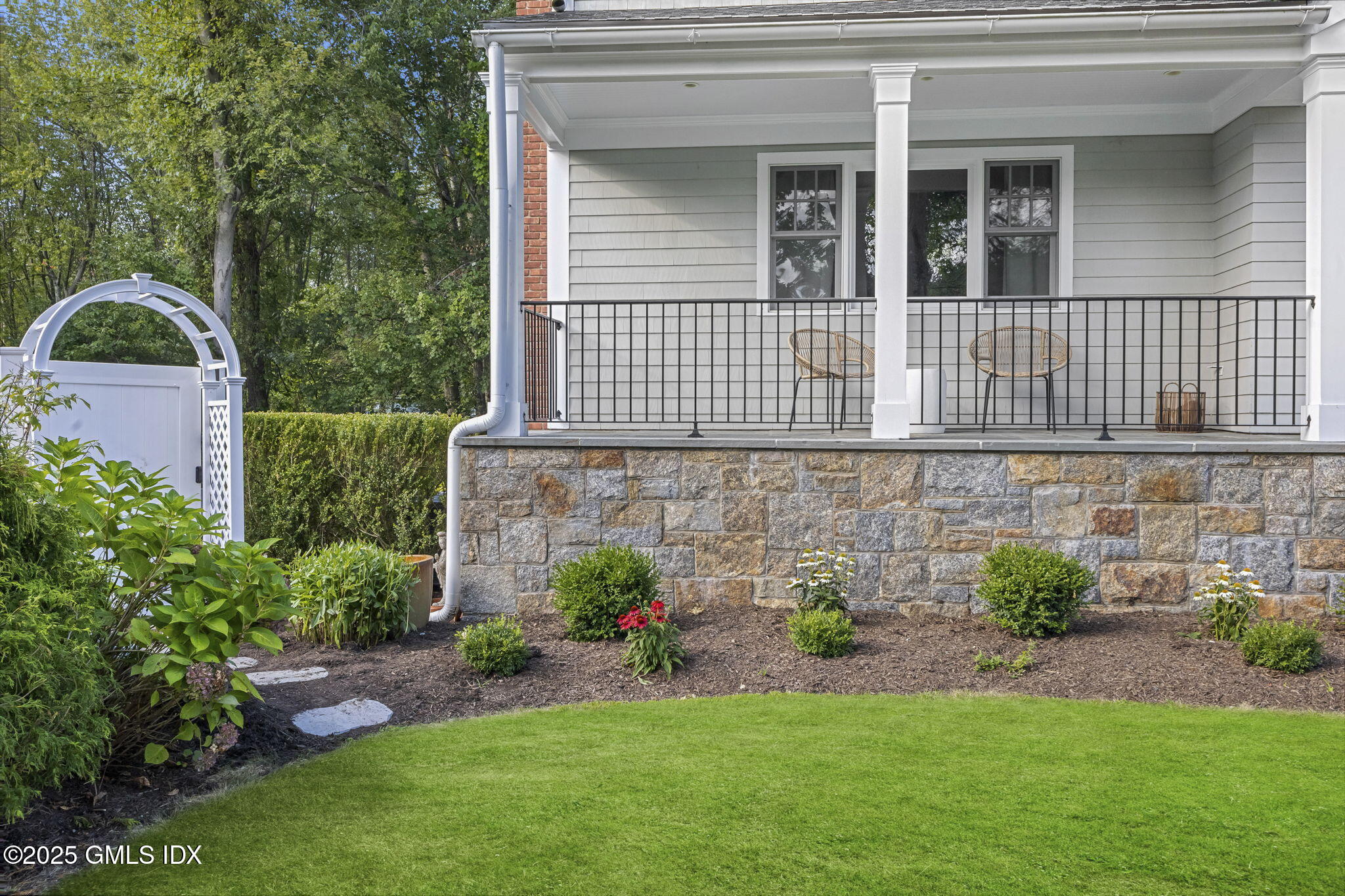 29 Griffith Road Riverside, CT 06878 - Photo 22 of 25 a front view of a house with a yard