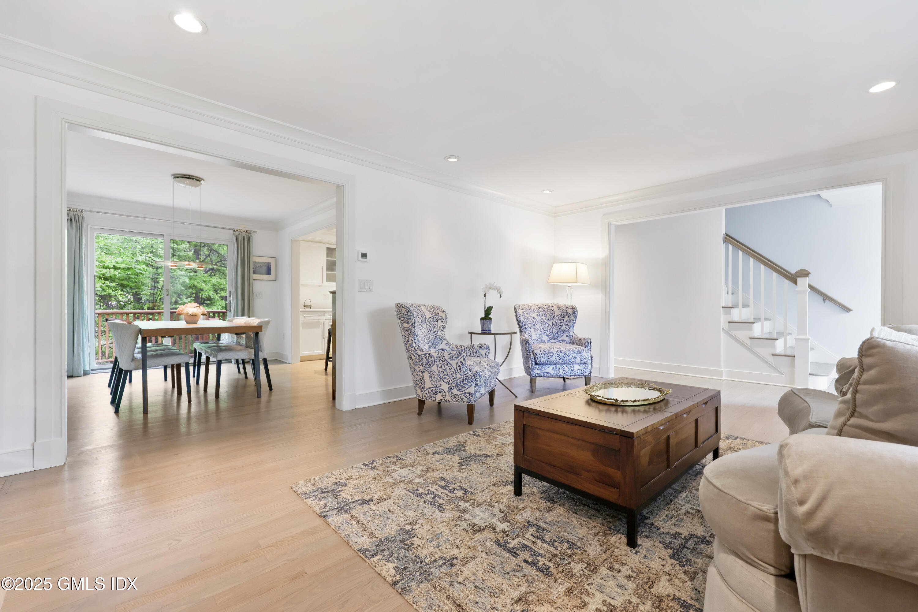 29 Griffith Road Riverside, CT 06878 - Photo 5 of 25 a living room with furniture a dining table and a window