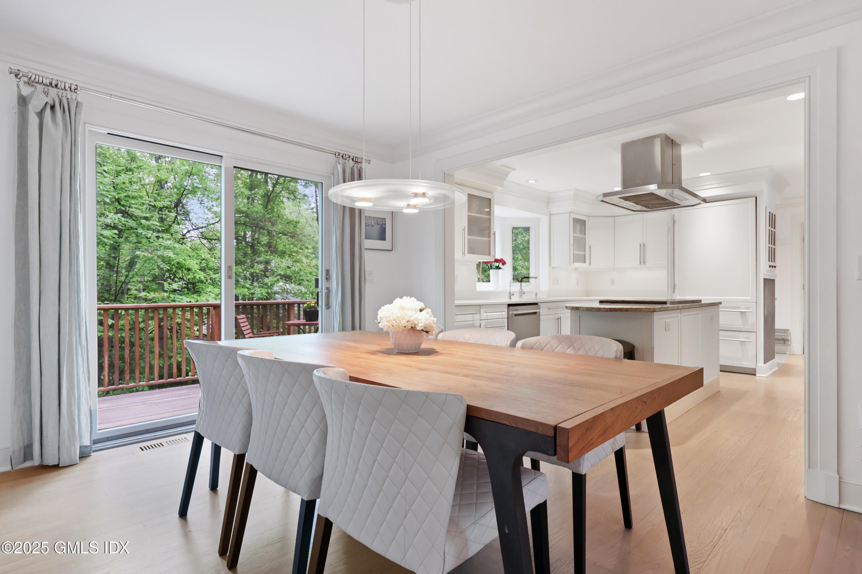 29 Griffith Road Riverside, CT 06878 - Photo 6 of 25 a view of a dining room with furniture window and wooden floor