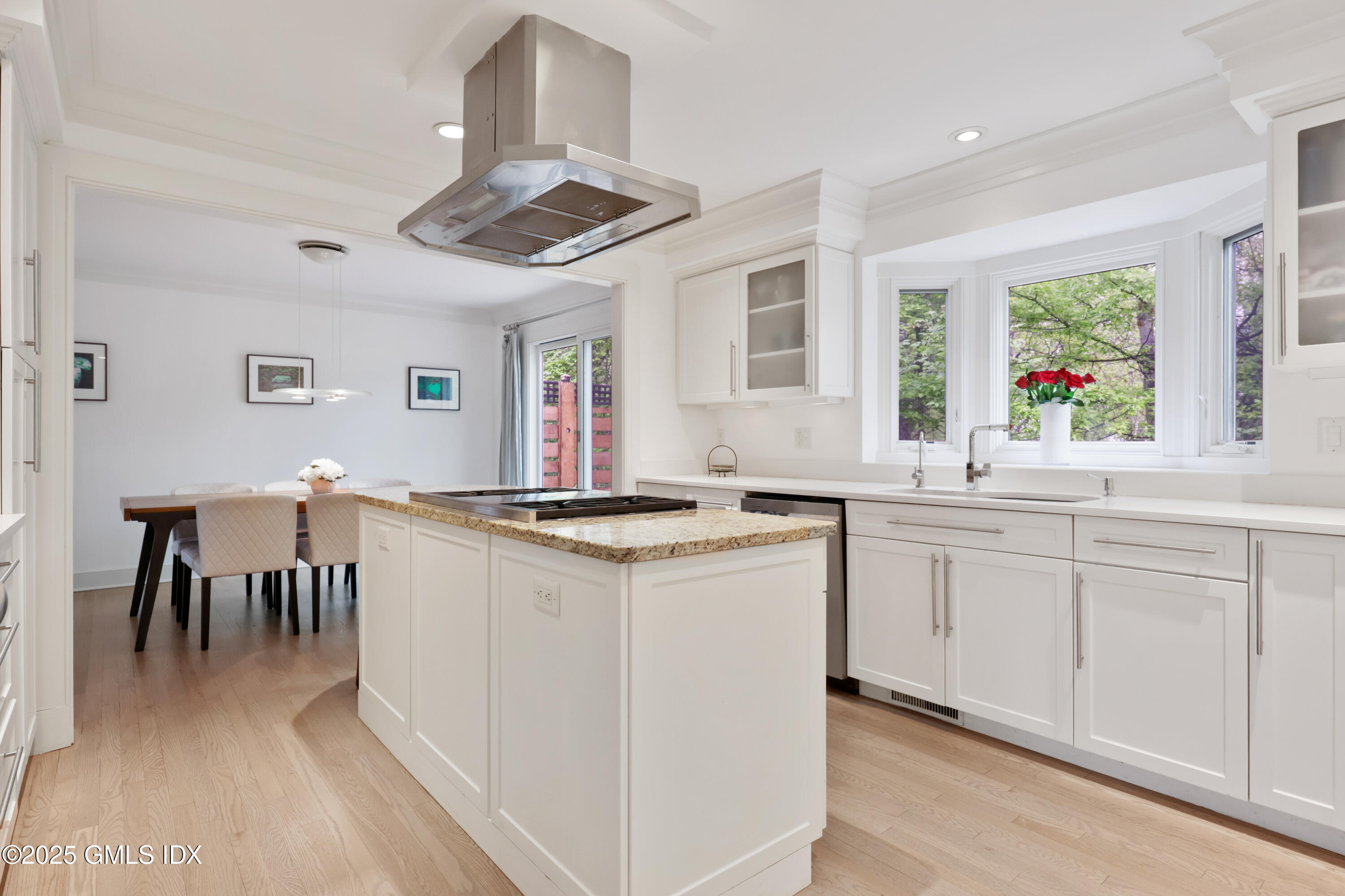 29 Griffith Road Riverside, CT 06878 - Photo 8 of 25 a kitchen with stainless steel appliances granite countertop a stove and a sink