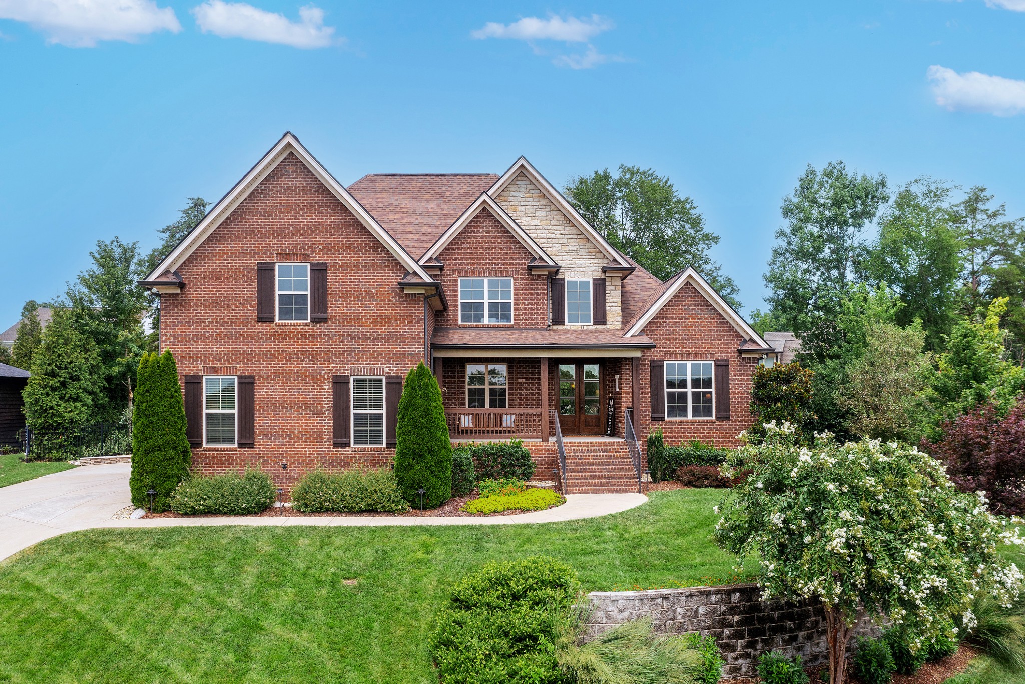 209 Ridgeview Preserve Drive Mount Juliet, TN 37122 - Photo 1 of 46 a front view of a house with a yard and potted plants