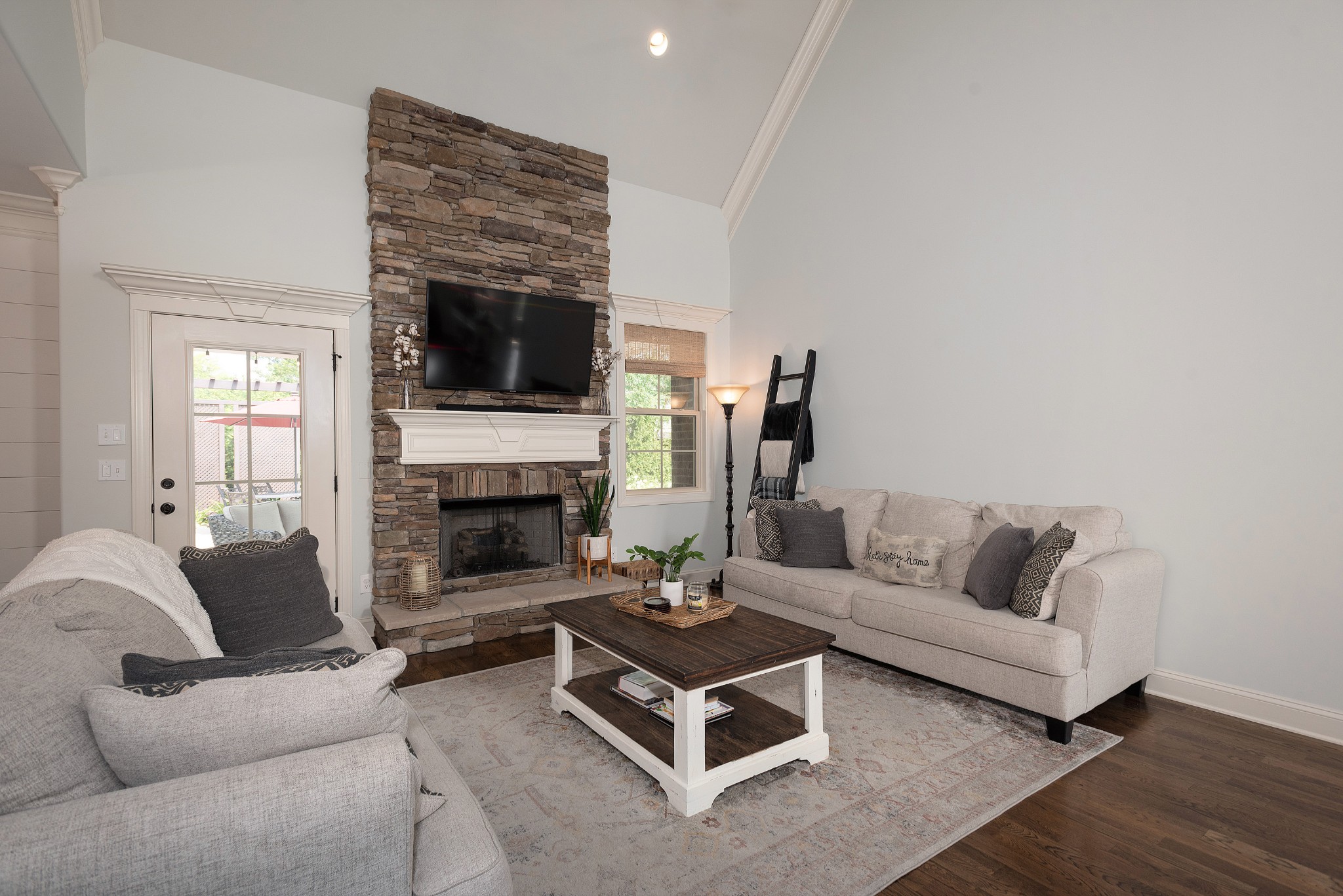 209 Ridgeview Preserve Drive Mount Juliet, TN 37122 - Photo 12 of 46 a living room with furniture a flat screen tv and a fireplace