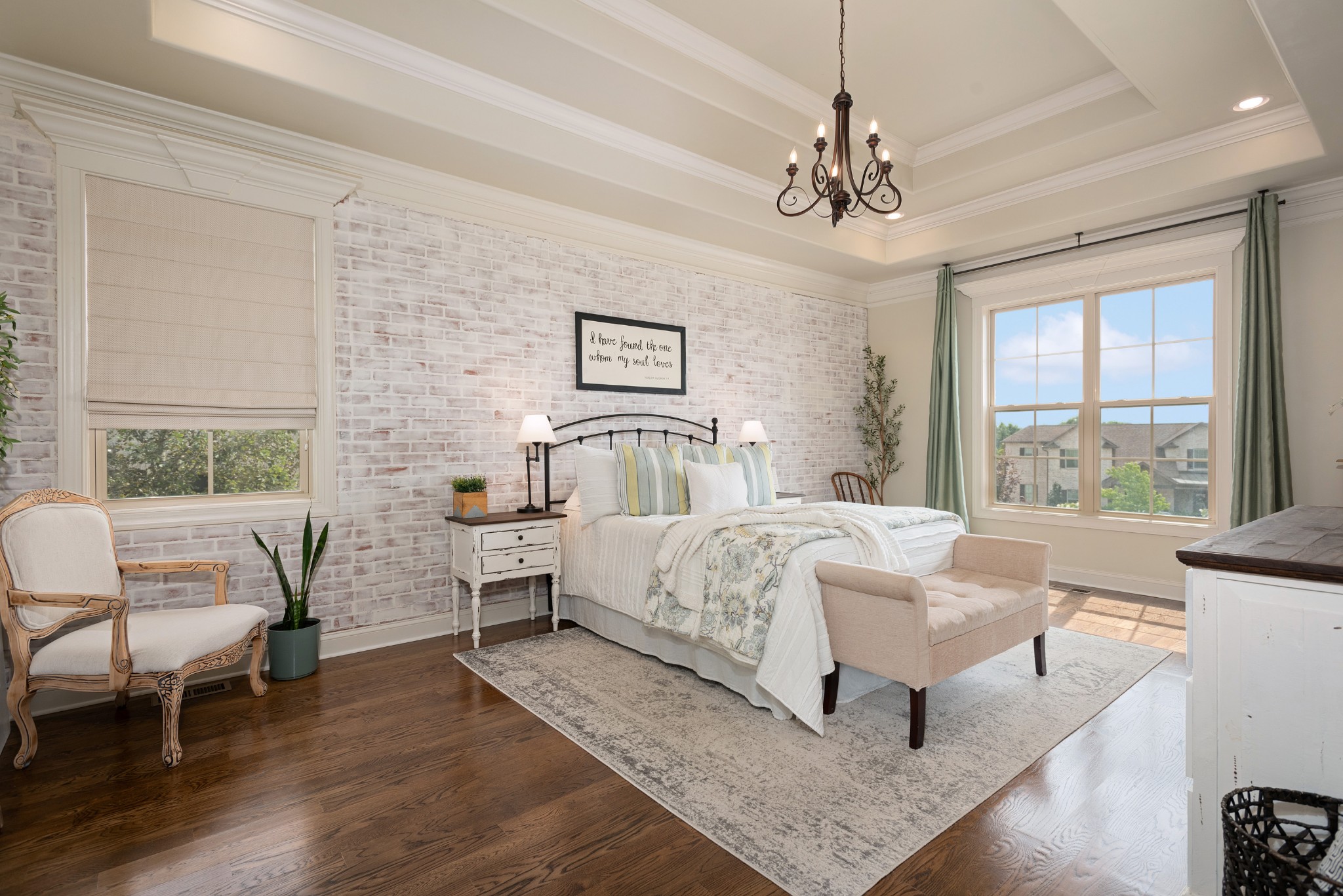 209 Ridgeview Preserve Drive Mount Juliet, TN 37122 - Photo 14 of 46 a bedroom with a bed and a chandelier