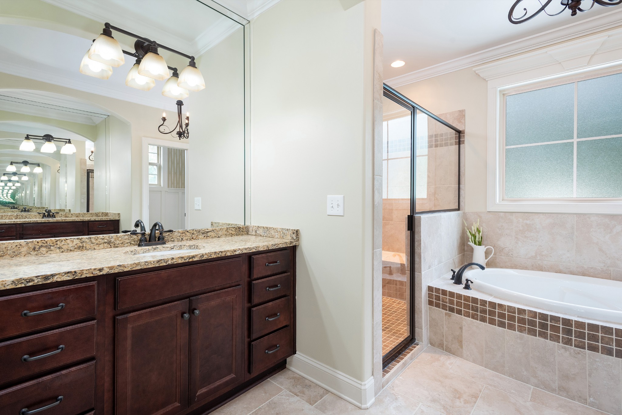 209 Ridgeview Preserve Drive Mount Juliet, TN 37122 - Photo 17 of 46 a bathroom with a granite countertop sink mirror and a bathtub