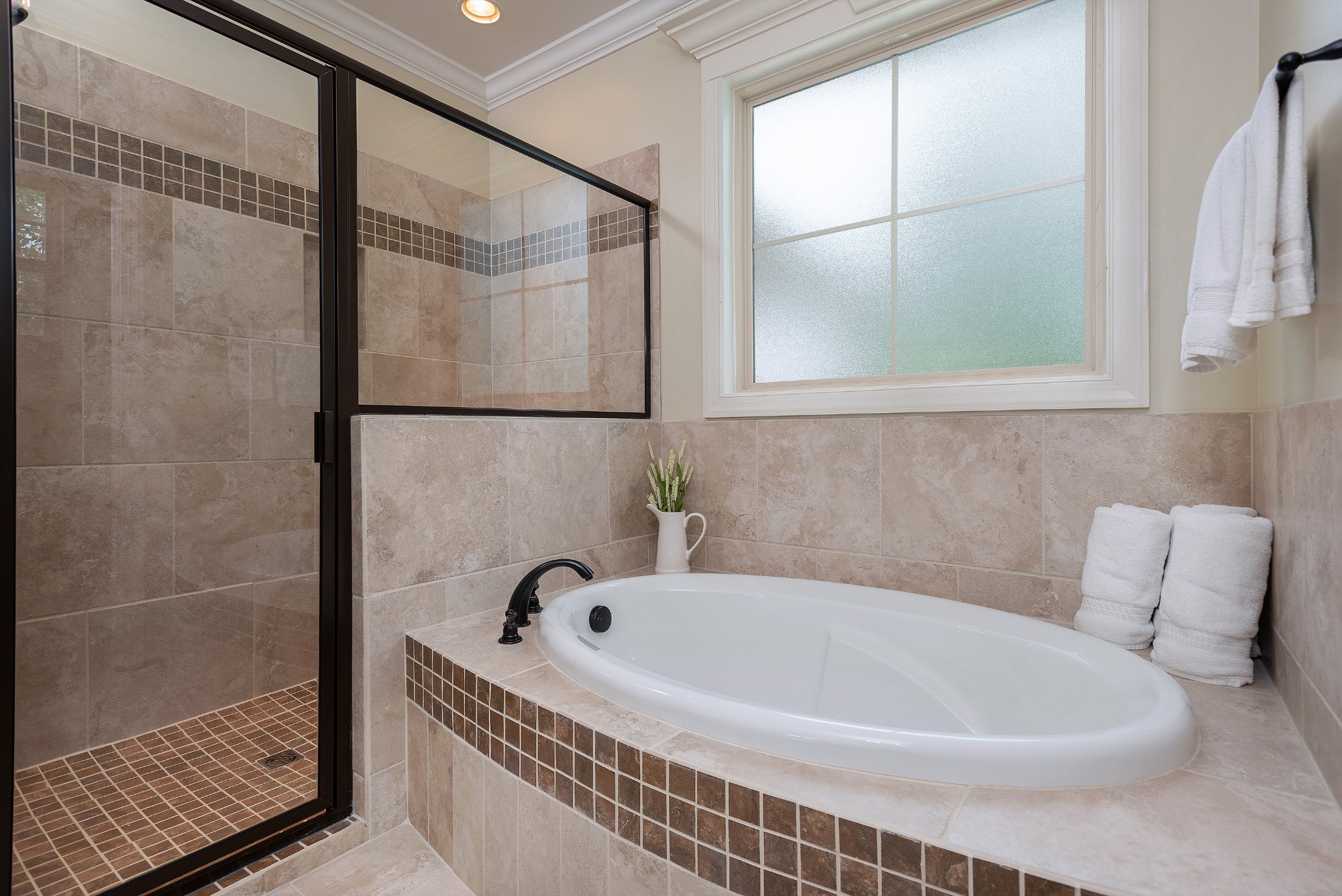 209 Ridgeview Preserve Drive Mount Juliet, TN 37122 - Photo 18 of 46 a bathroom with a bathtub and shower