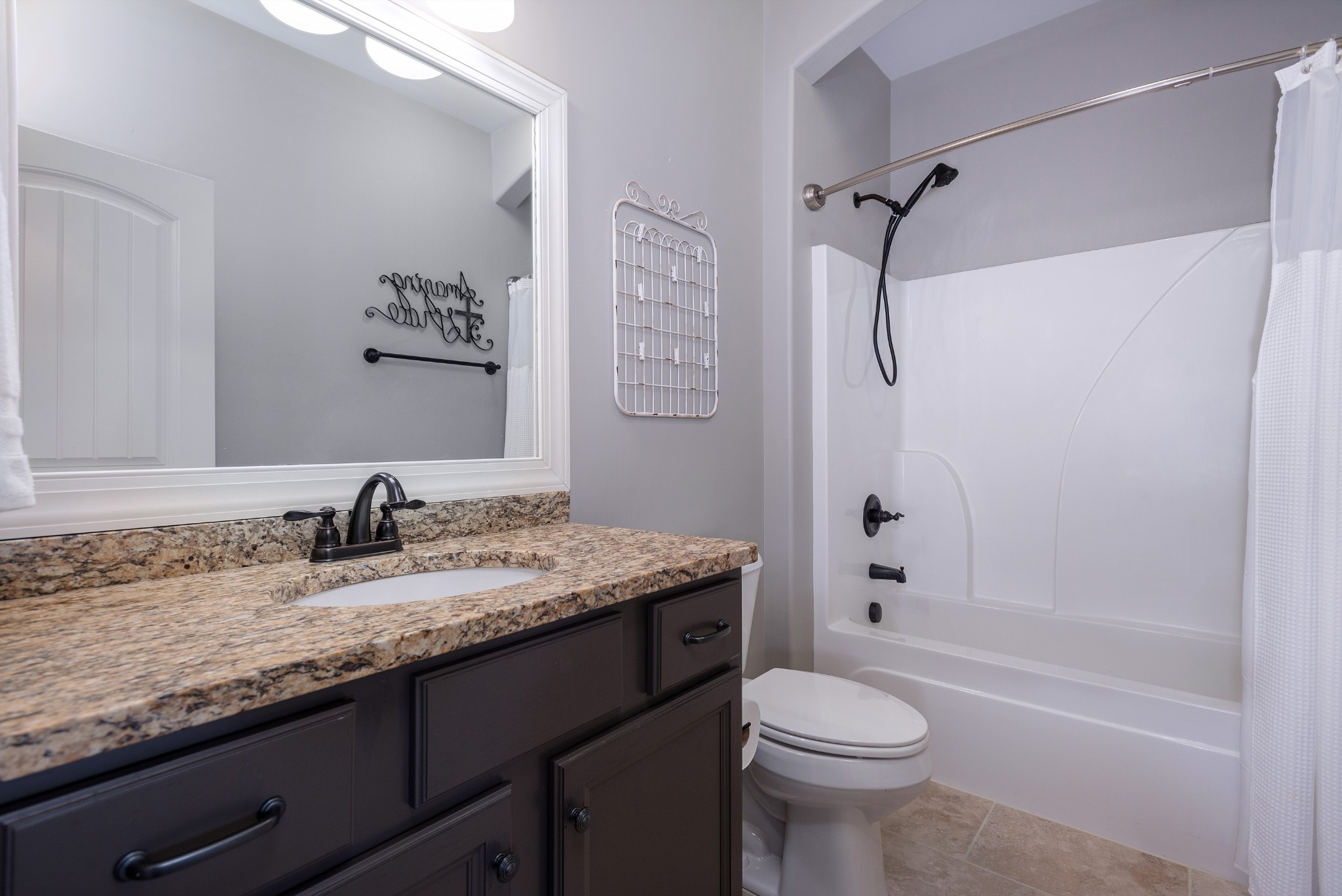 209 Ridgeview Preserve Drive Mount Juliet, TN 37122 - Photo 20 of 46 a bathroom with a granite countertop sink toilet and shower