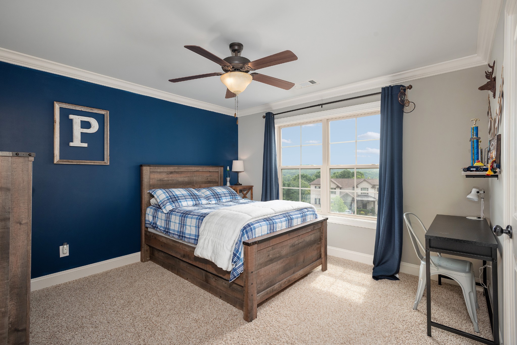 209 Ridgeview Preserve Drive Mount Juliet, TN 37122 - Photo 22 of 46 a bed sitting in a spacious bedroom next to a window
