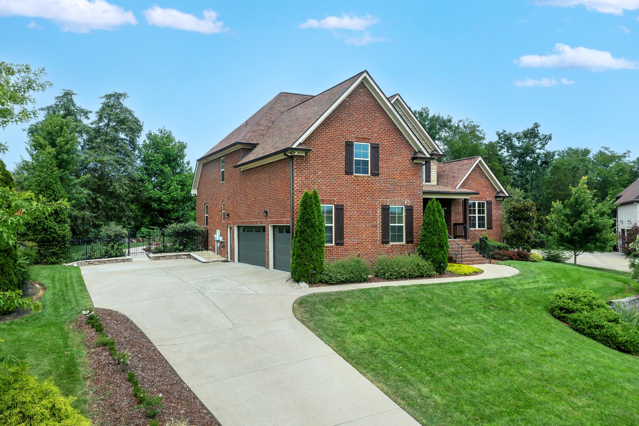 209 Ridgeview Preserve Drive Mount Juliet, TN 37122 - Photo 45 of 46 a front view of a house with a yard and garage