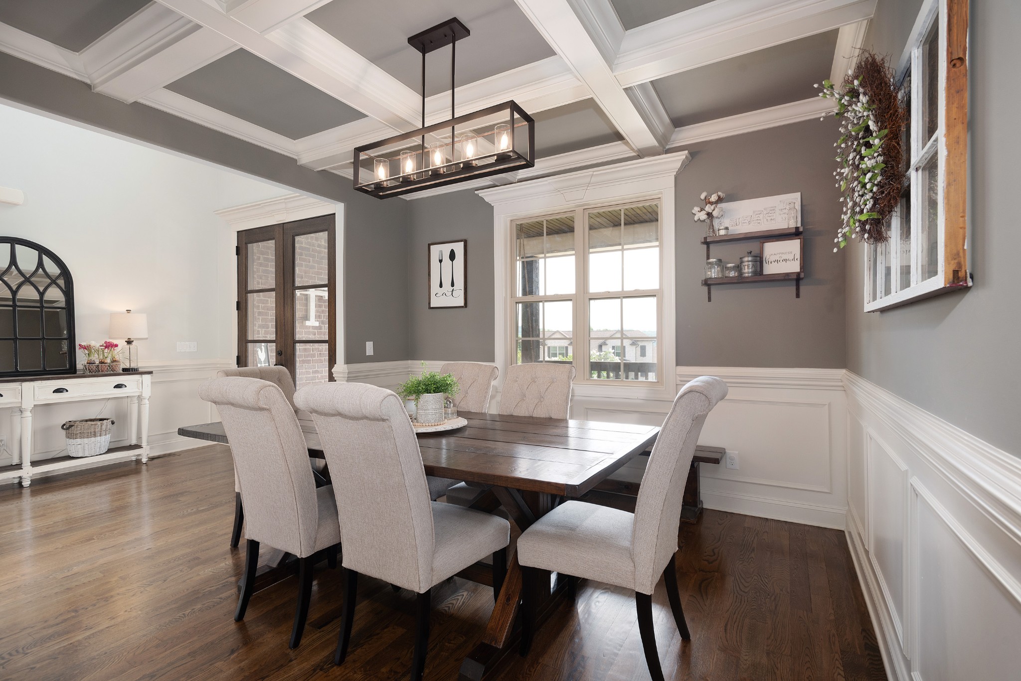 209 Ridgeview Preserve Drive Mount Juliet, TN 37122 - Photo 5 of 46 a view of a dining room with furniture a chandelier and wooden floor