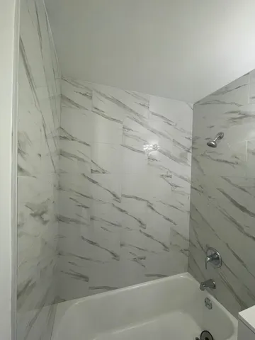 a bathroom with a bathtub