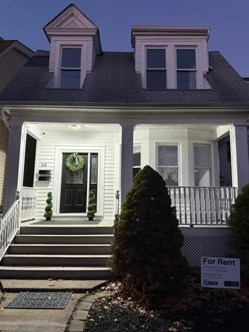 a view of a house with a garden