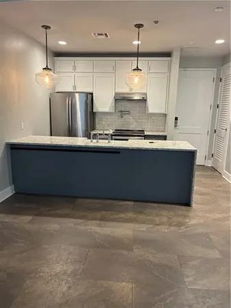 $1,635 | 818 Howard Avenue, Unit 204, New Orleans, LA 70130