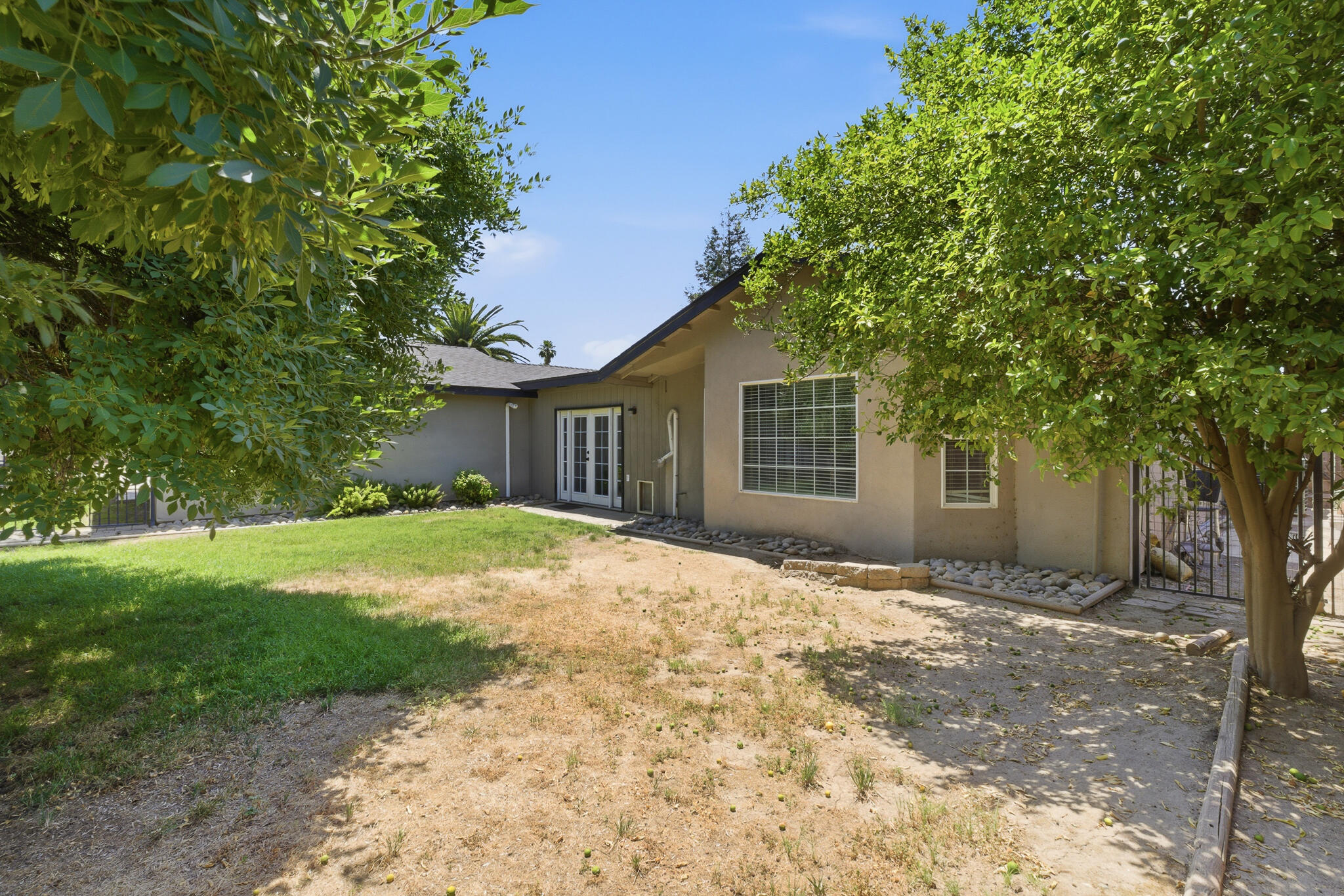618 Birdsong Court Exeter, CA 93221 - Photo 61 of 62 a view of a house with backyard and tree