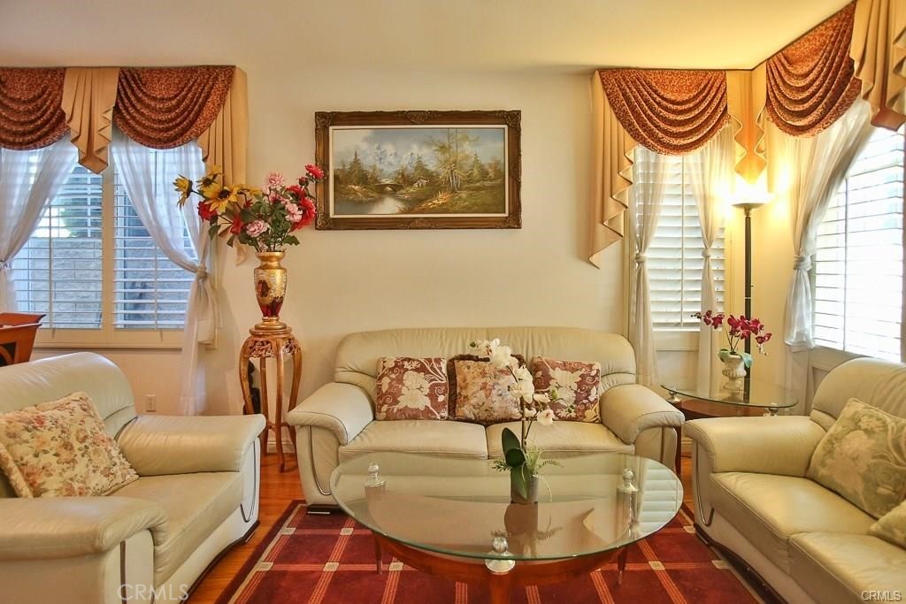 6302 Lavender Way Westminster, CA 92683 - Photo 5 of 38 a living room with furniture and a large window