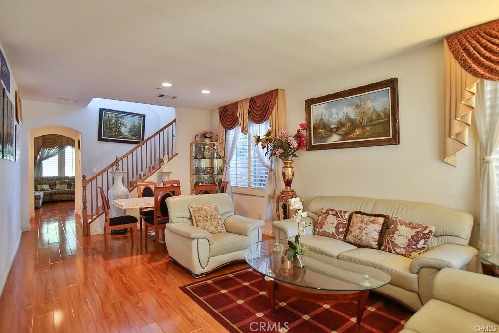 6302 Lavender Way Westminster, CA 92683 - Photo 7 of 38 a living room with furniture and wooden floor