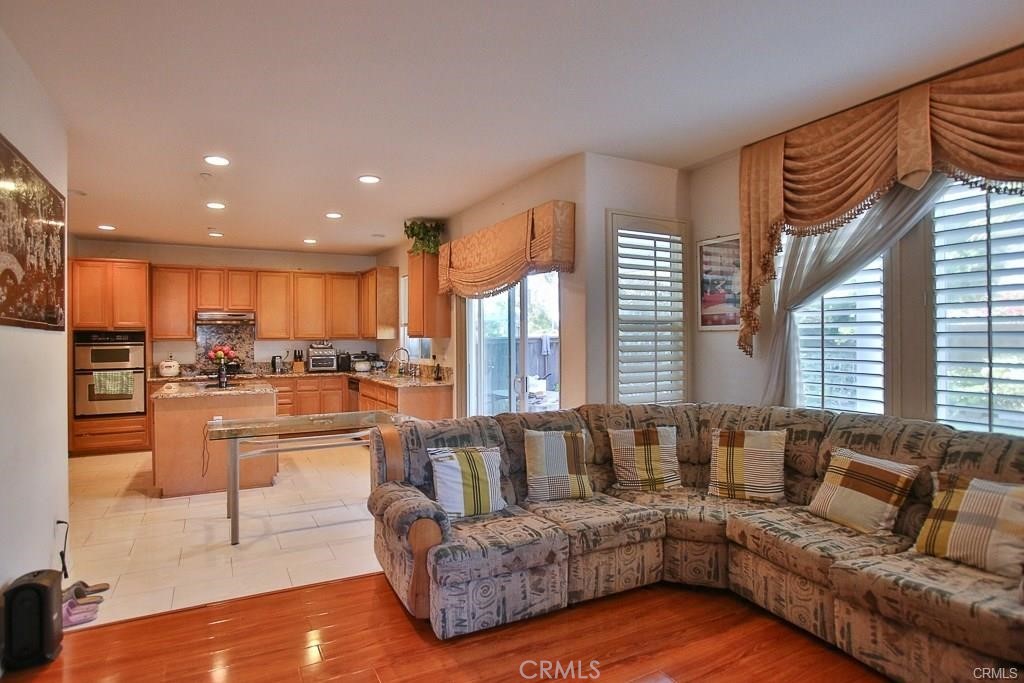 6302 Lavender Way Westminster, CA 92683 - Photo 9 of 38 a living room with furniture and a large window