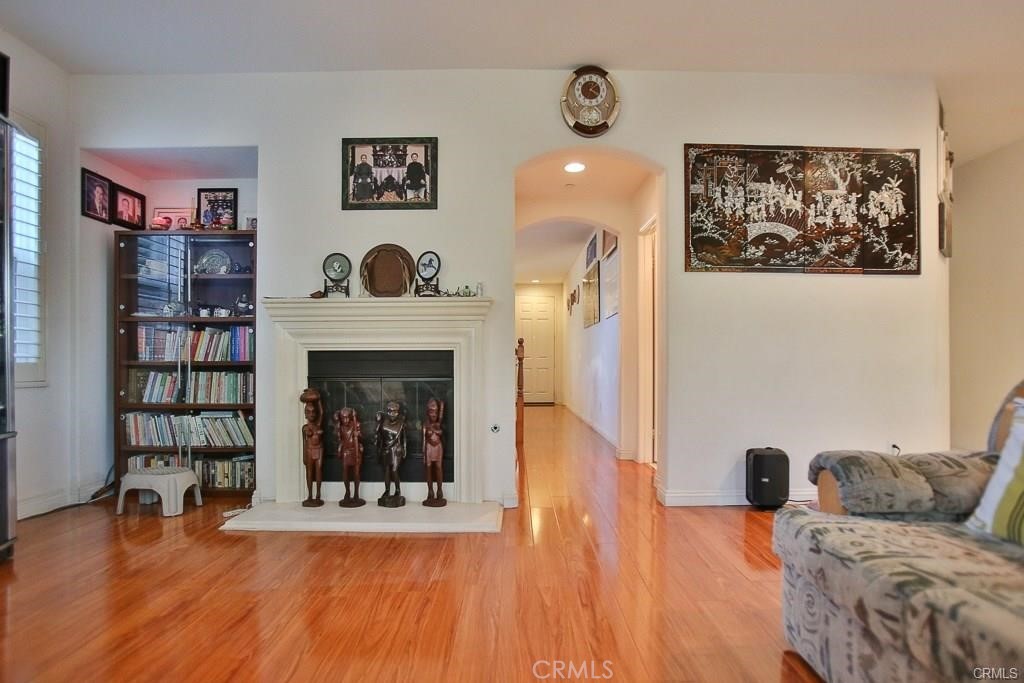 6302 Lavender Way Westminster, CA 92683 - Photo 10 of 38 a living room with furniture and a fireplace