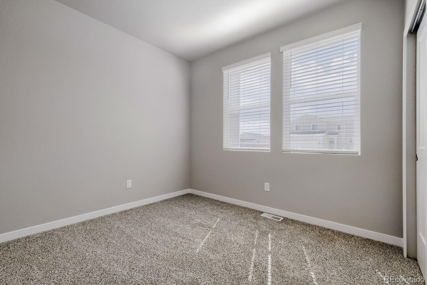 471 Atchison Way Calhan, CO 80808 - Photo 22 of 31 a room that has a window in it