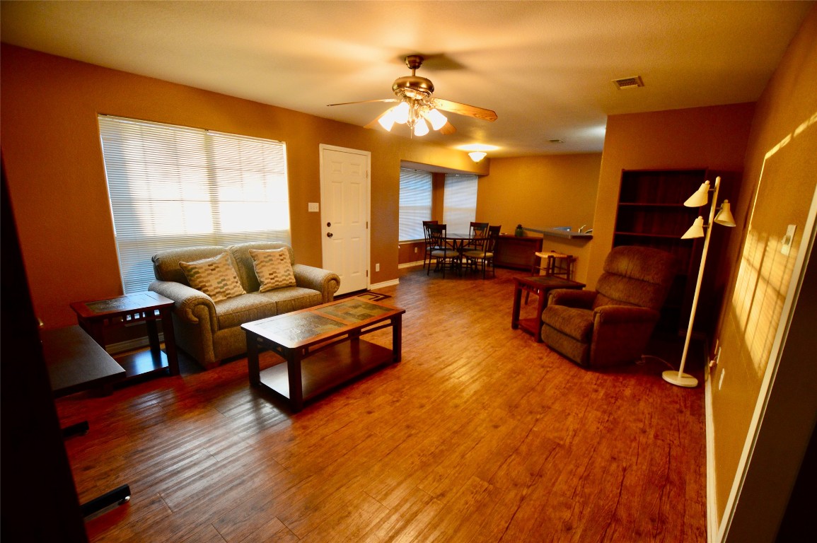 643 Yegua Street Lexington, TX 78947 - Photo 3 of 10 a living room with furniture and a large window