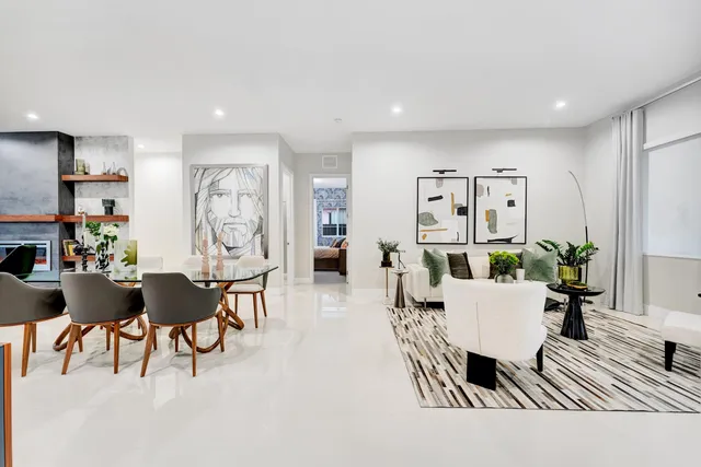 a living room with furniture and a table